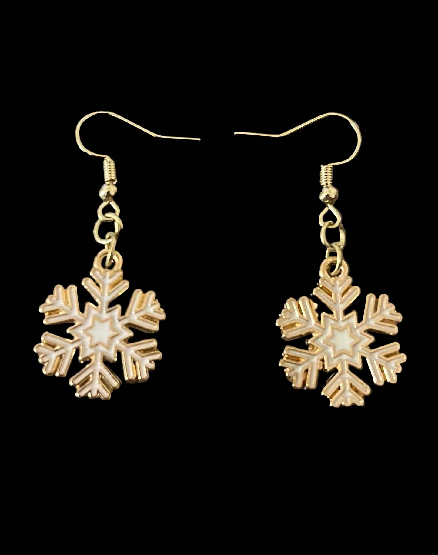 Christmas white snowflake earrings surrounded by gold