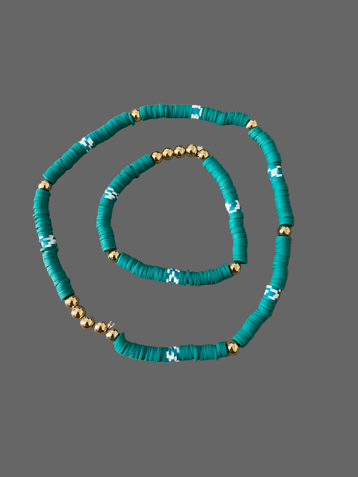 Christmas 7.5in bracelet and 14in choker necklace. Green and white clay beads with gold accents